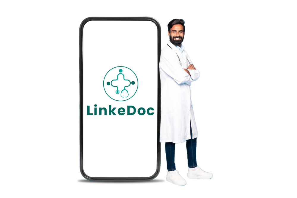 Doctor standing by the side of a phone with LinkeDoc logo on it.